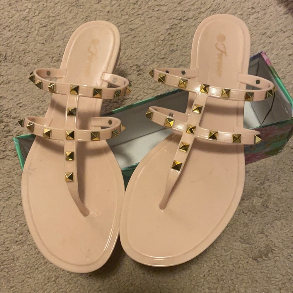 Brand new studded jelly flip flops. New in box